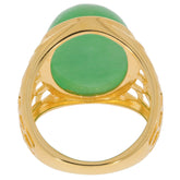 Oval green jadeite sterling silver ring showcasing a sparkling gemstone and intricate band design.